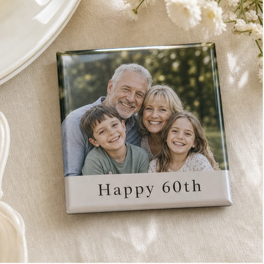 Milestone birthday photo magnet on a table
